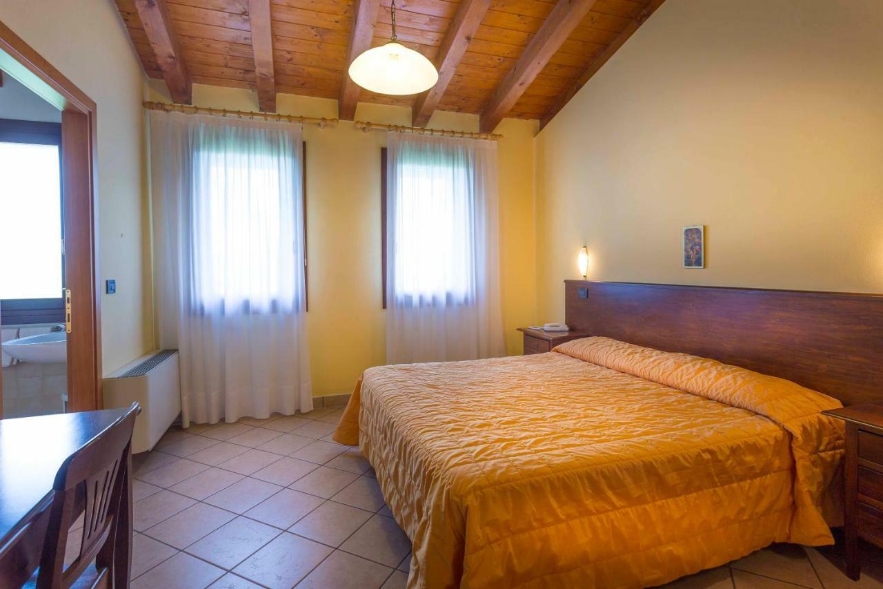 Agriturismo Tenuta Regina - Glamping Luxury Lodges And Apartments Palazzolo dello Stella Luaran gambar