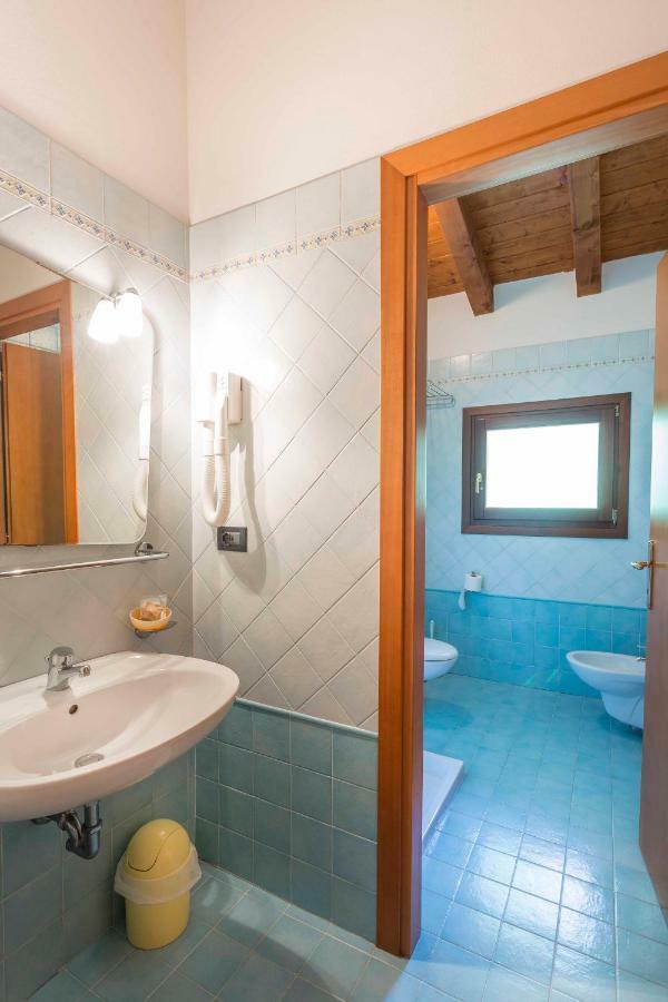 Agriturismo Tenuta Regina - Glamping Luxury Lodges And Apartments Palazzolo dello Stella Luaran gambar